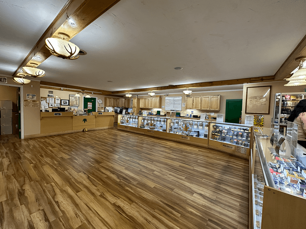 Inside of Sumpter Nugget Dispensary with display cases, in Sumpter, Oregon.